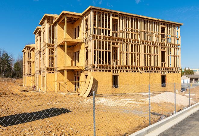 a view of a temporary chain link fence that surrounds a job site, providing security in Suisun City, CA